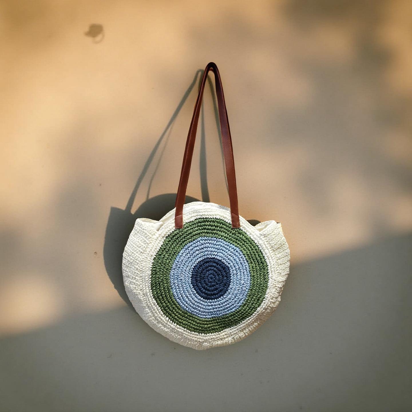 RAFFIA EVIL EYE HANDBAG Esperance